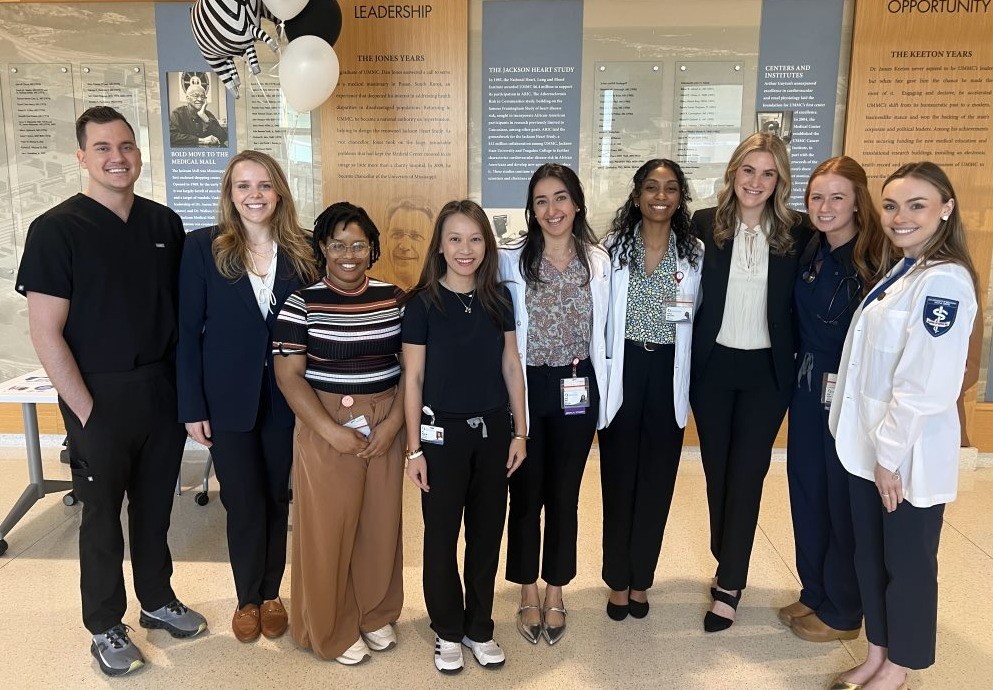 Drs. Thy Huynh and Dr. Mark Albrecht attended the Rare Disease Day Research Symposium on February 27, 2025, with members of the UMMC School of Medicine’s Dermatology Interest Group.